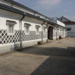 A traditional white-walled sake brewery, or "sakagura"